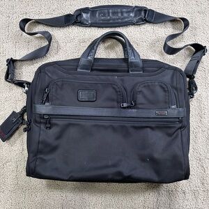 Black Tumi canvas briefcase